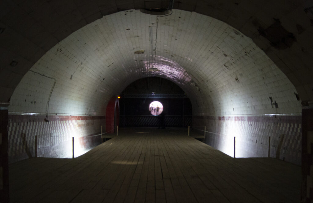 RAI, installation view, Tunnel, video projected on wall, 2014