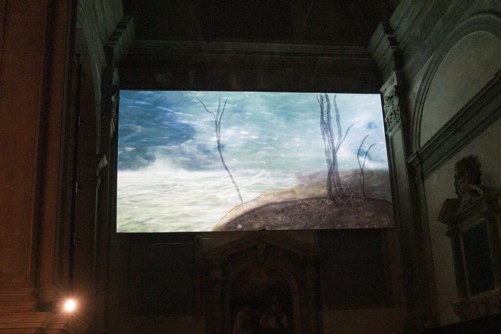 Irina Nakhova, Creation of the Animals, video projected on church wall, installation view, 2019